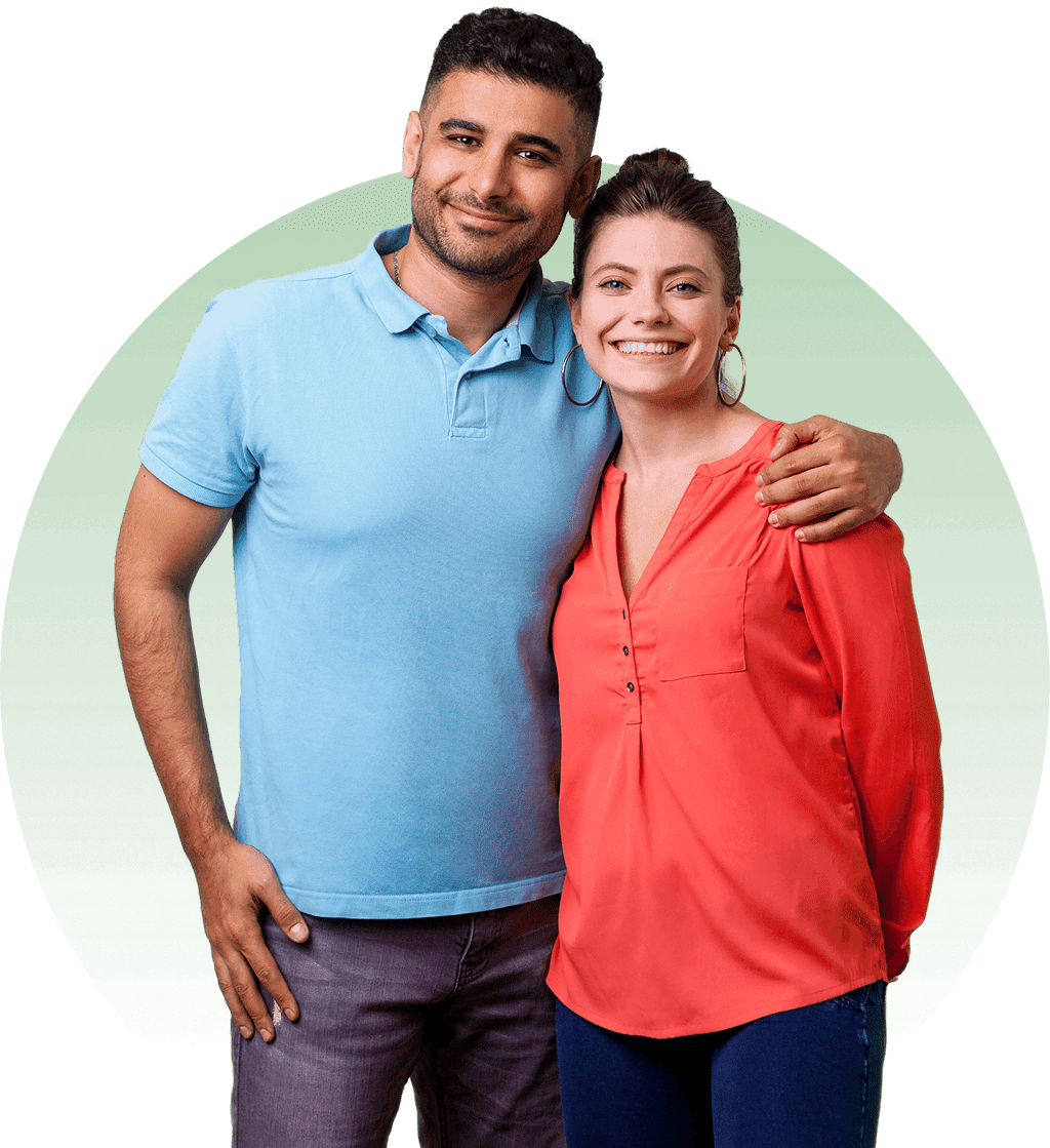 A man and woman posing for the camera.