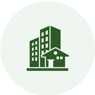A green icon of buildings and a house.